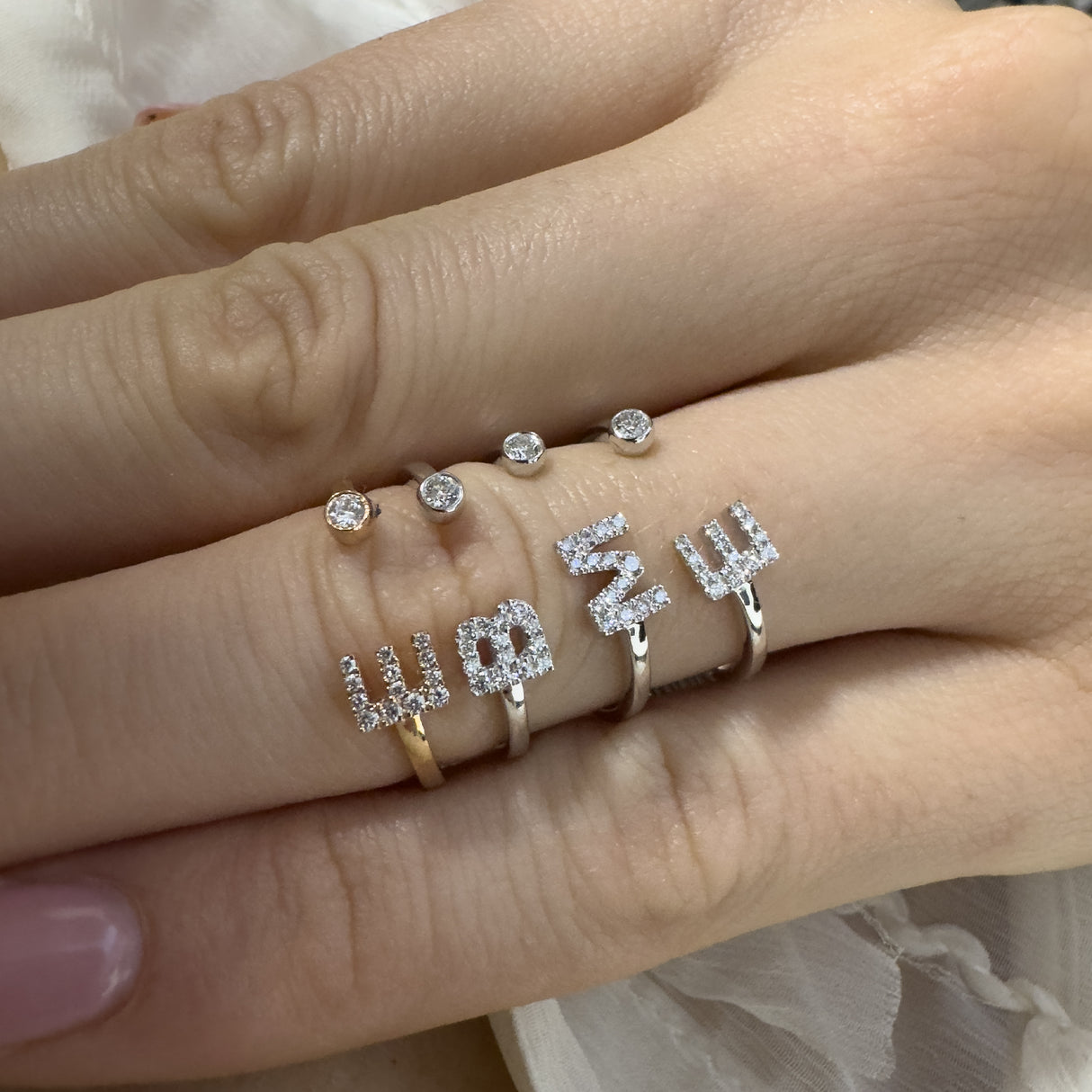 Initial ring letter and with white gold diamonds
