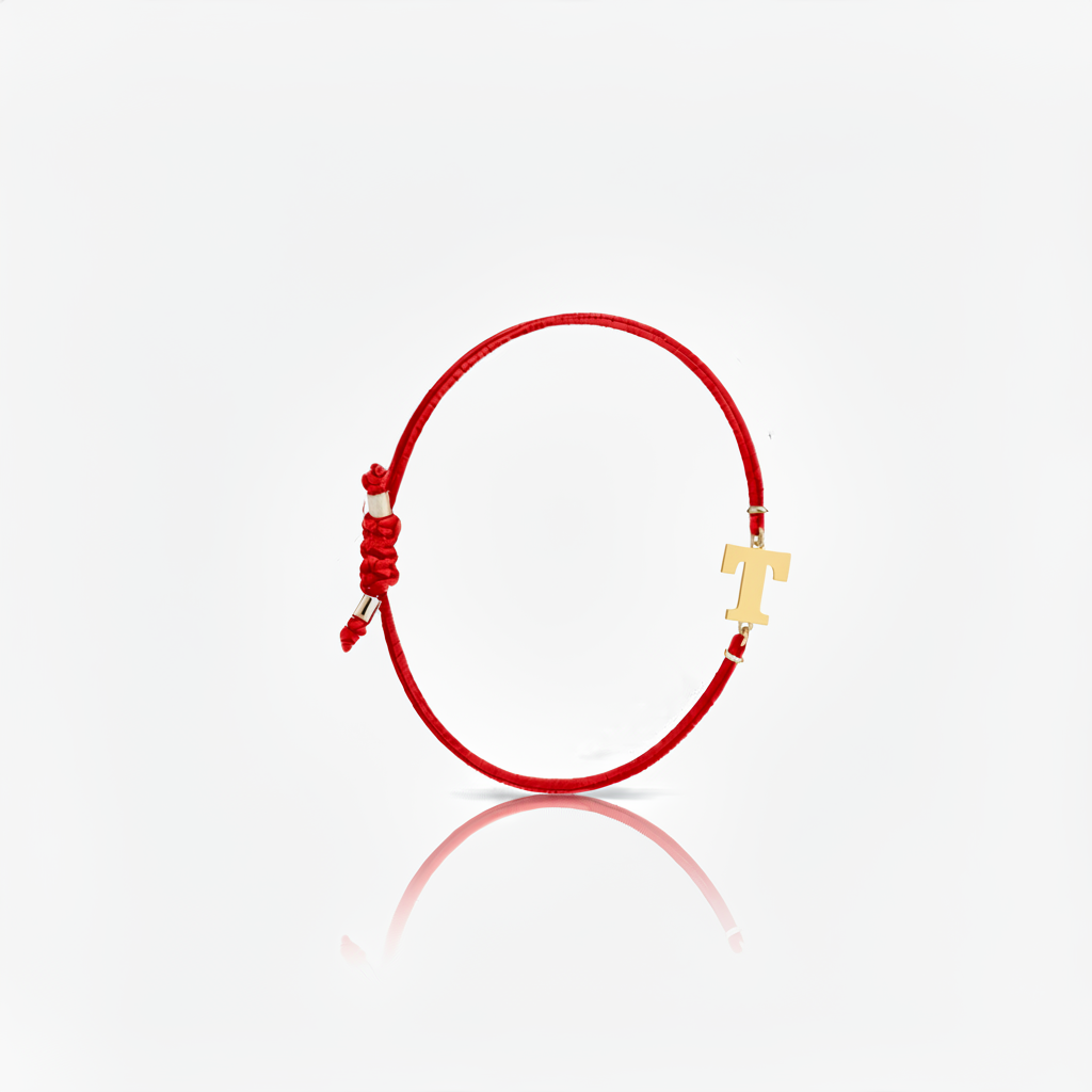 Initial bracelet on black cord