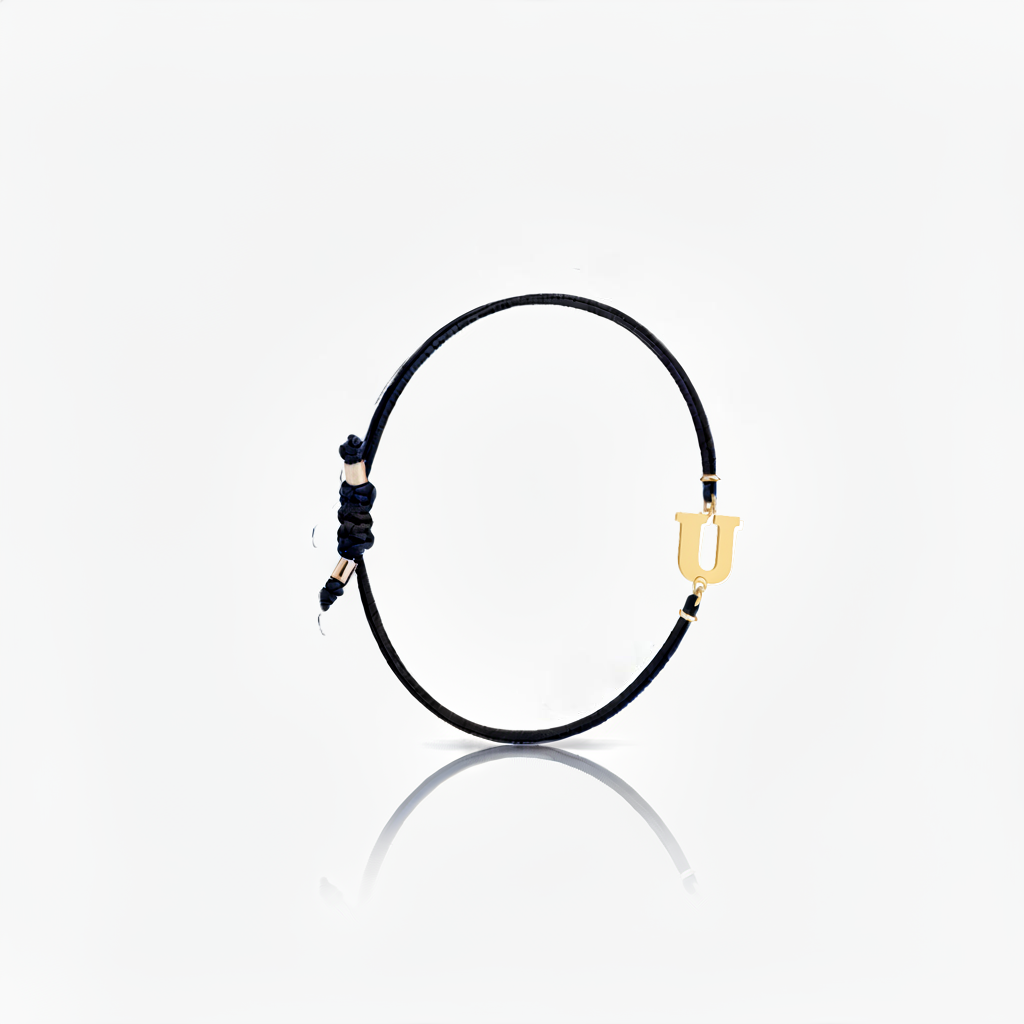 Initial bracelet on black cord