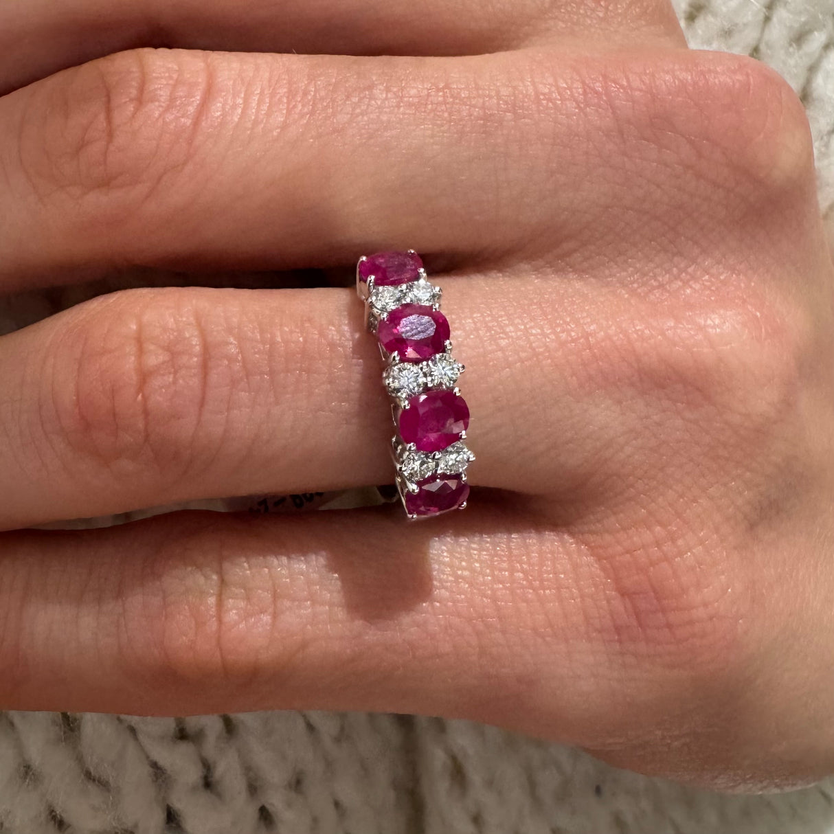 White gold dares ring with 4 oval rubies and diamonds