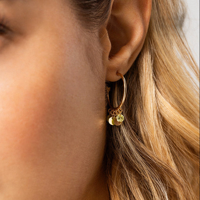 Mono-orecchino hoop zirconi verde lime e medaglie pendenti