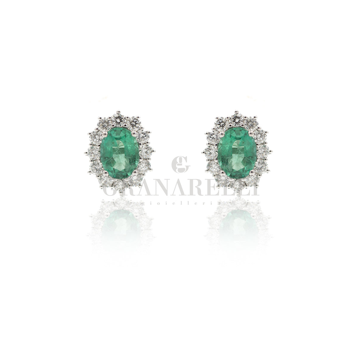 Oval emerald earrings 0.55kt and diamonds