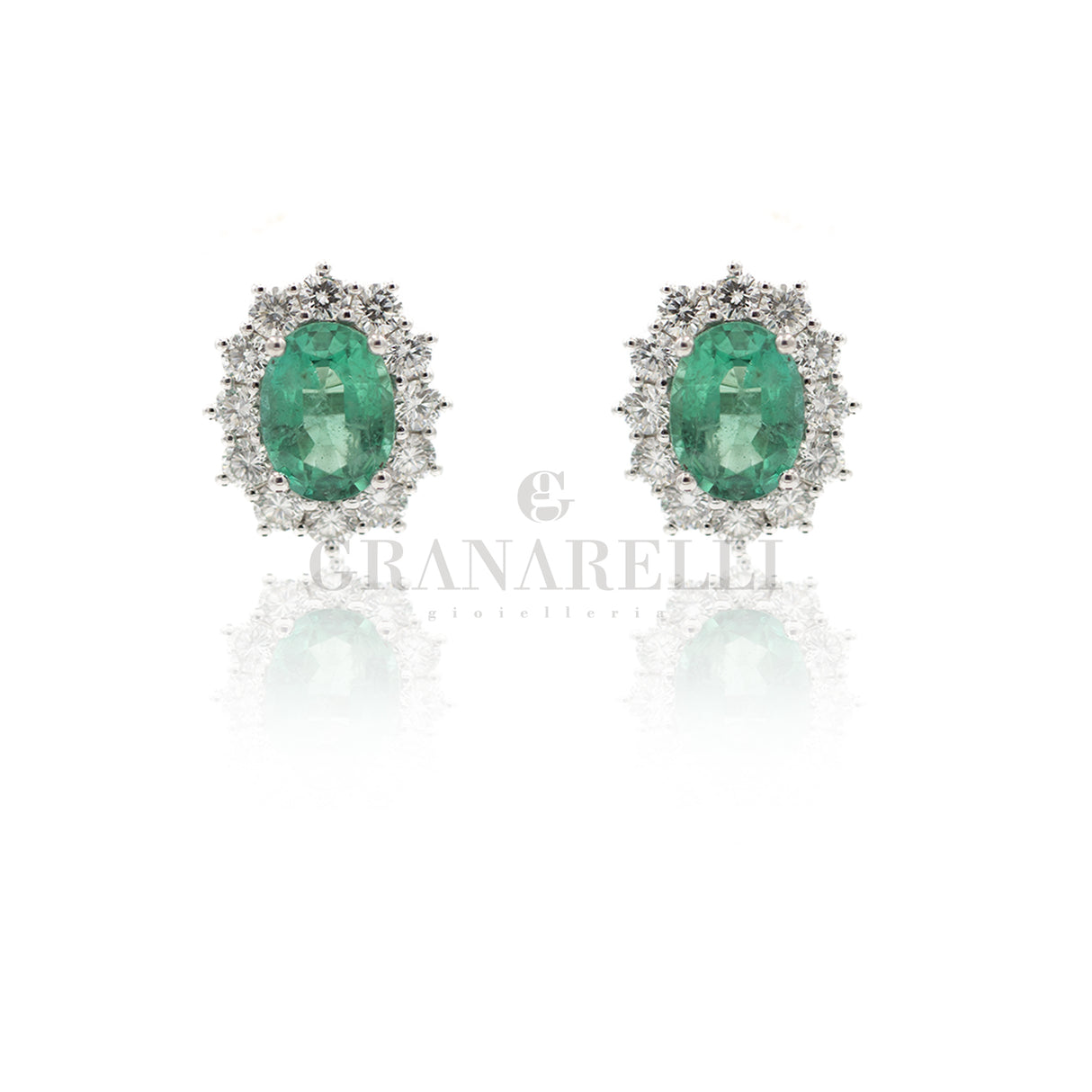 Oval emerald earrings 0.55kt and diamonds