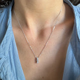 Musa scalar pendant in white gold and diamonds