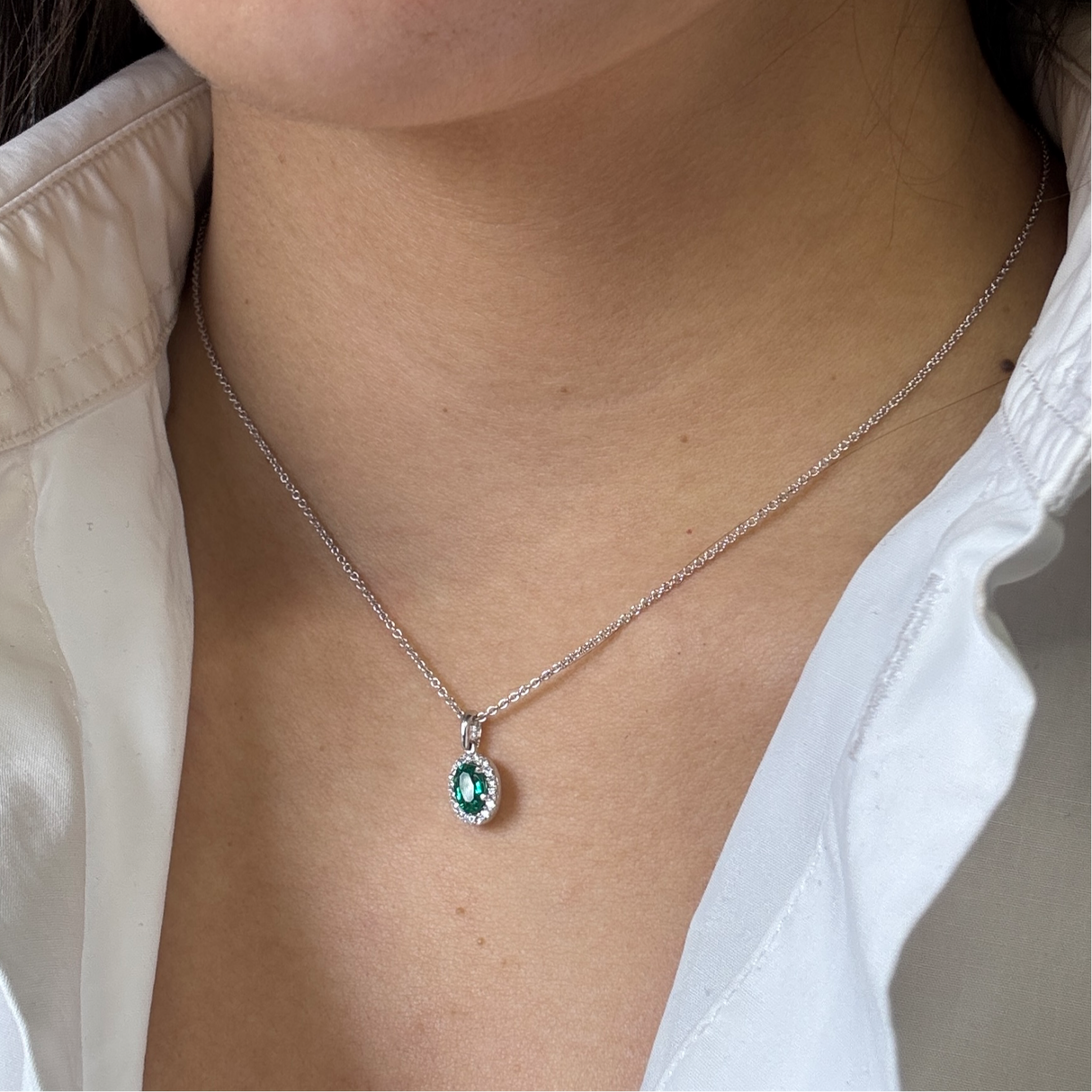 Oval emerald crew and diamonds