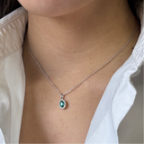 Oval emerald crew and diamonds