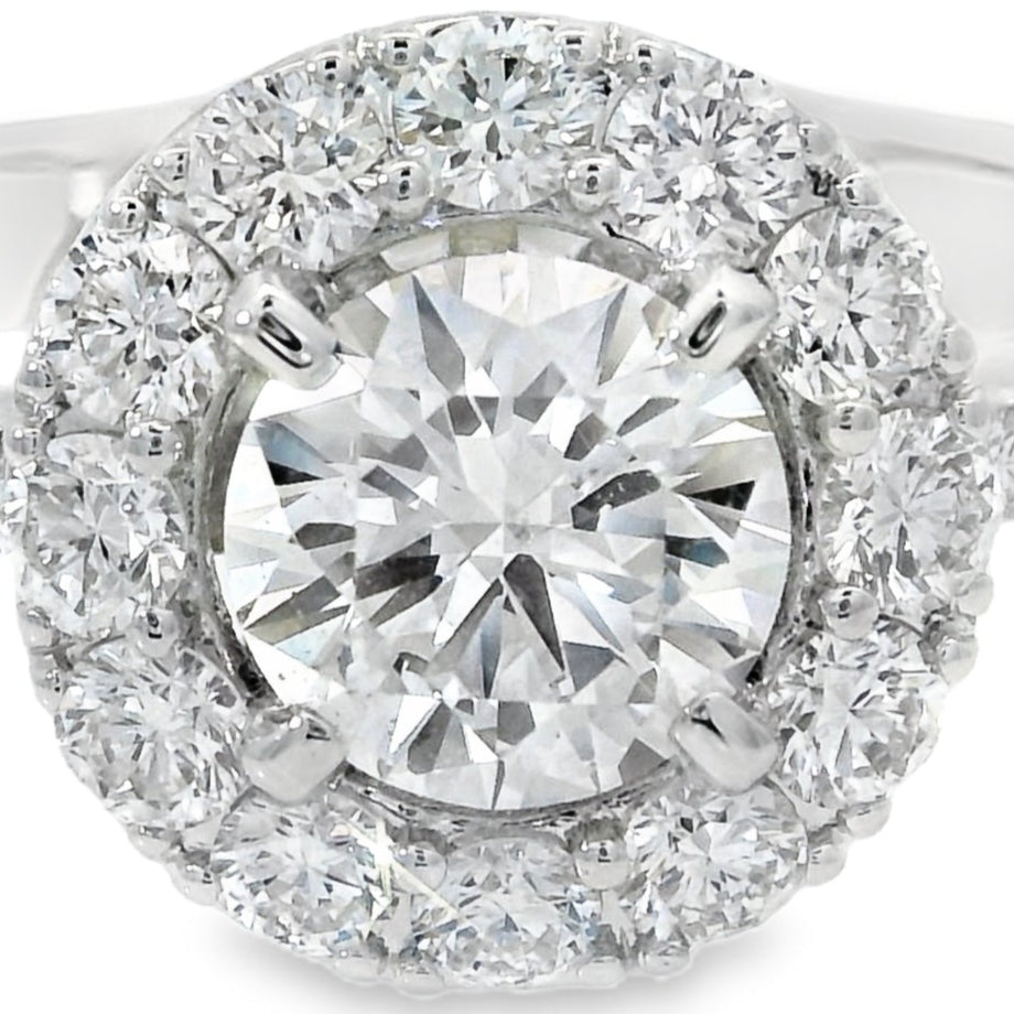 Anello Halo Oro bianco e Diamanti 0.59 GIA