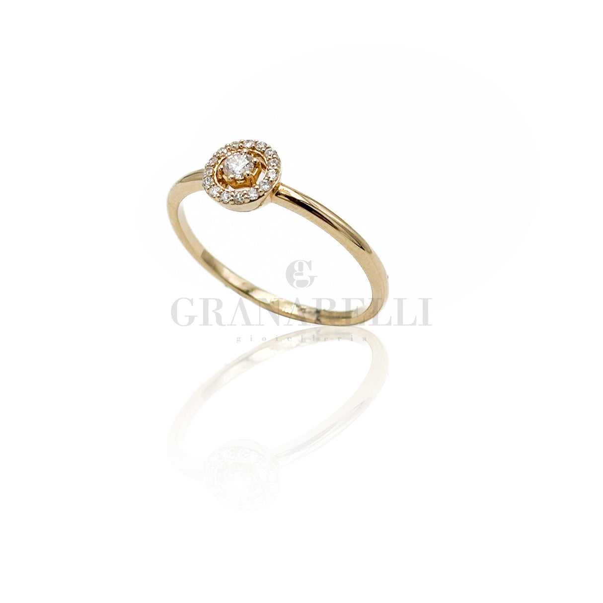 Anello In oro Giallo con contorno di diamanti
