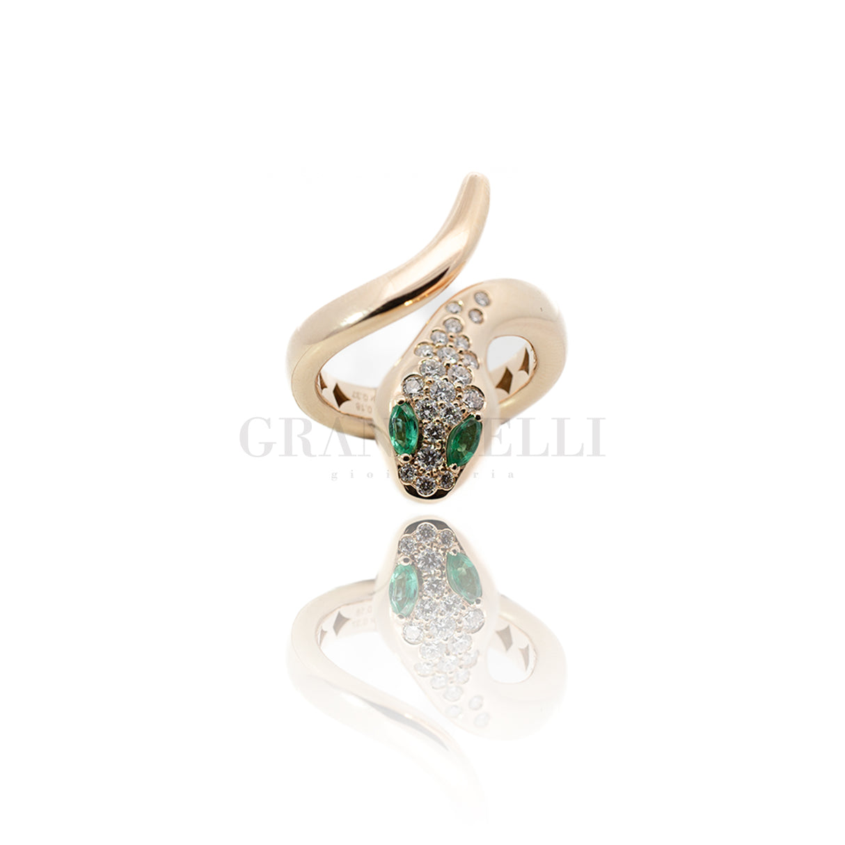 Rose gold and emerald gold snake ring and diamonds