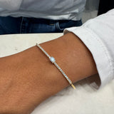 Bracciale Rigido oro giallo Diamante taglio Smeraldo 0.30 ct, e diamanti laterali