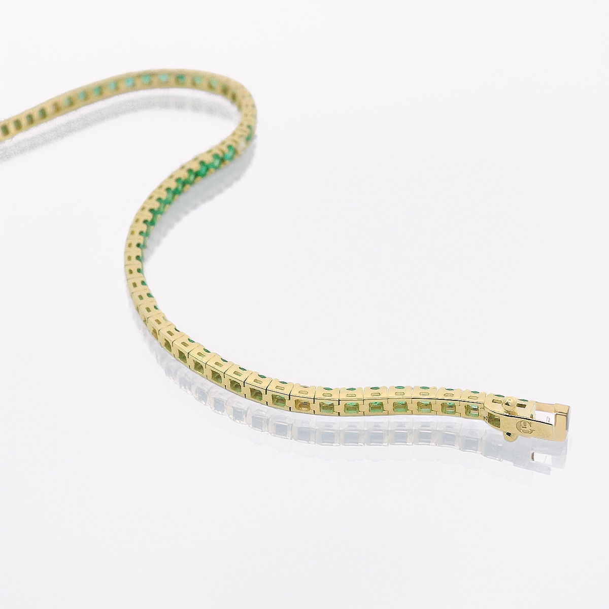 Bracciale Tennis Oro Giallo, Smeraldi 3,17kt e Spot Diamanti 0.33kt