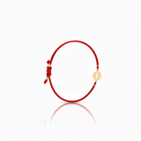 Initial bracelet on black cord