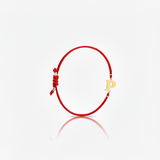 Initial bracelet on black cord