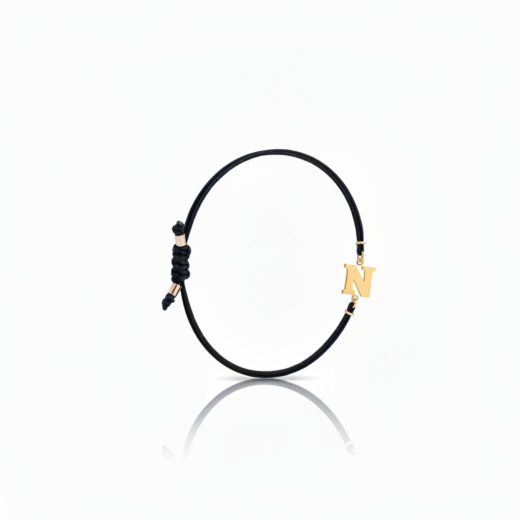Initial bracelet on black cord