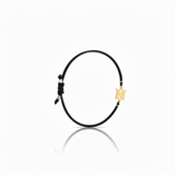 Initial bracelet on black cord