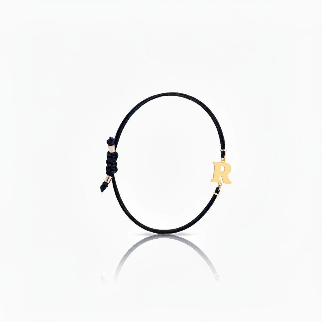 Initial bracelet on black cord