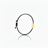 Initial bracelet on black cord