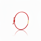 Initial bracelet on black cord