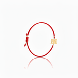 Initial bracelet on black cord