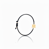 Initial bracelet on black cord