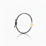 Initial bracelet on black cord