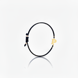 Initial bracelet on black cord