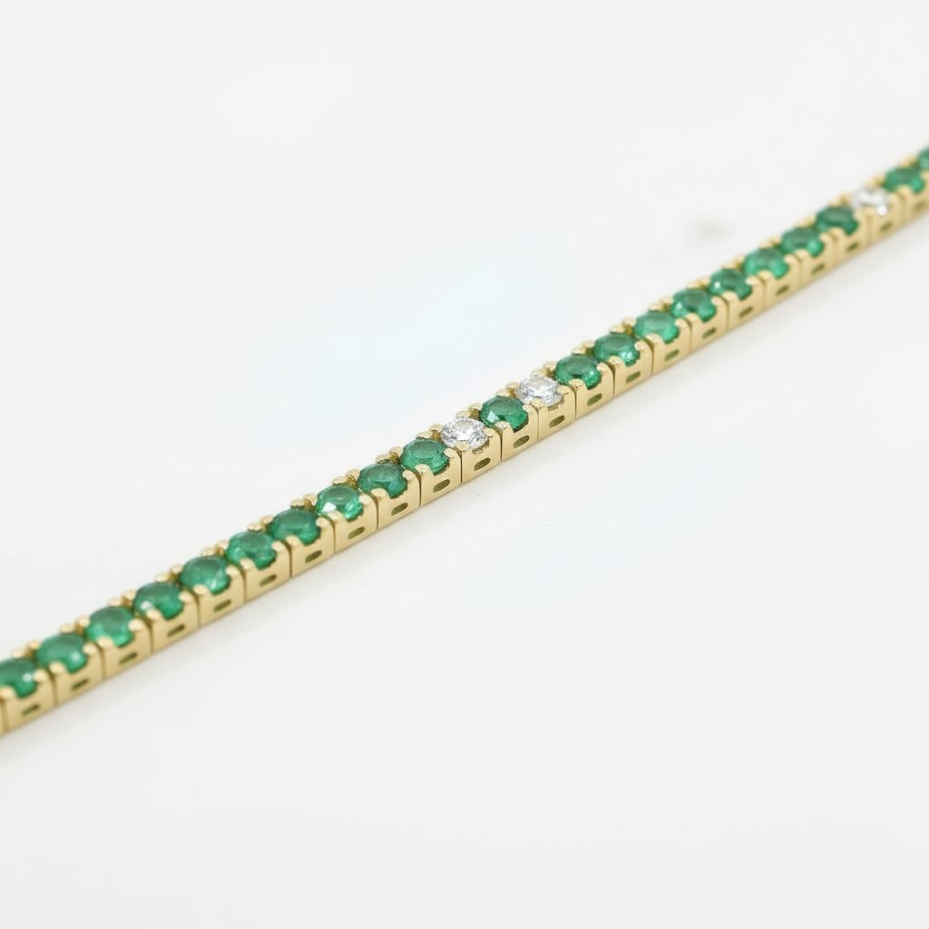 Bracciale Tennis Oro Giallo, Smeraldi 3,17kt e Spot Diamanti 0.33kt