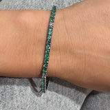 Bracciale Tennis Oro Bianco e Smeraldi 3.30kt e 5 spot bianchi