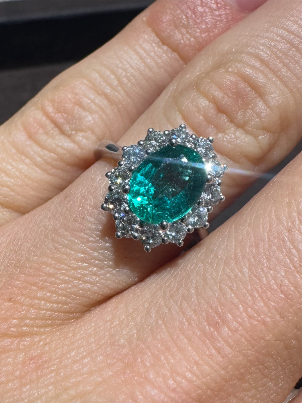 1.66kt emerald ring and white gold diamonds and diamonds