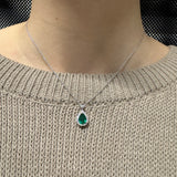 Smerald Cound of 0.80kt "Drop" cutting with diamonds