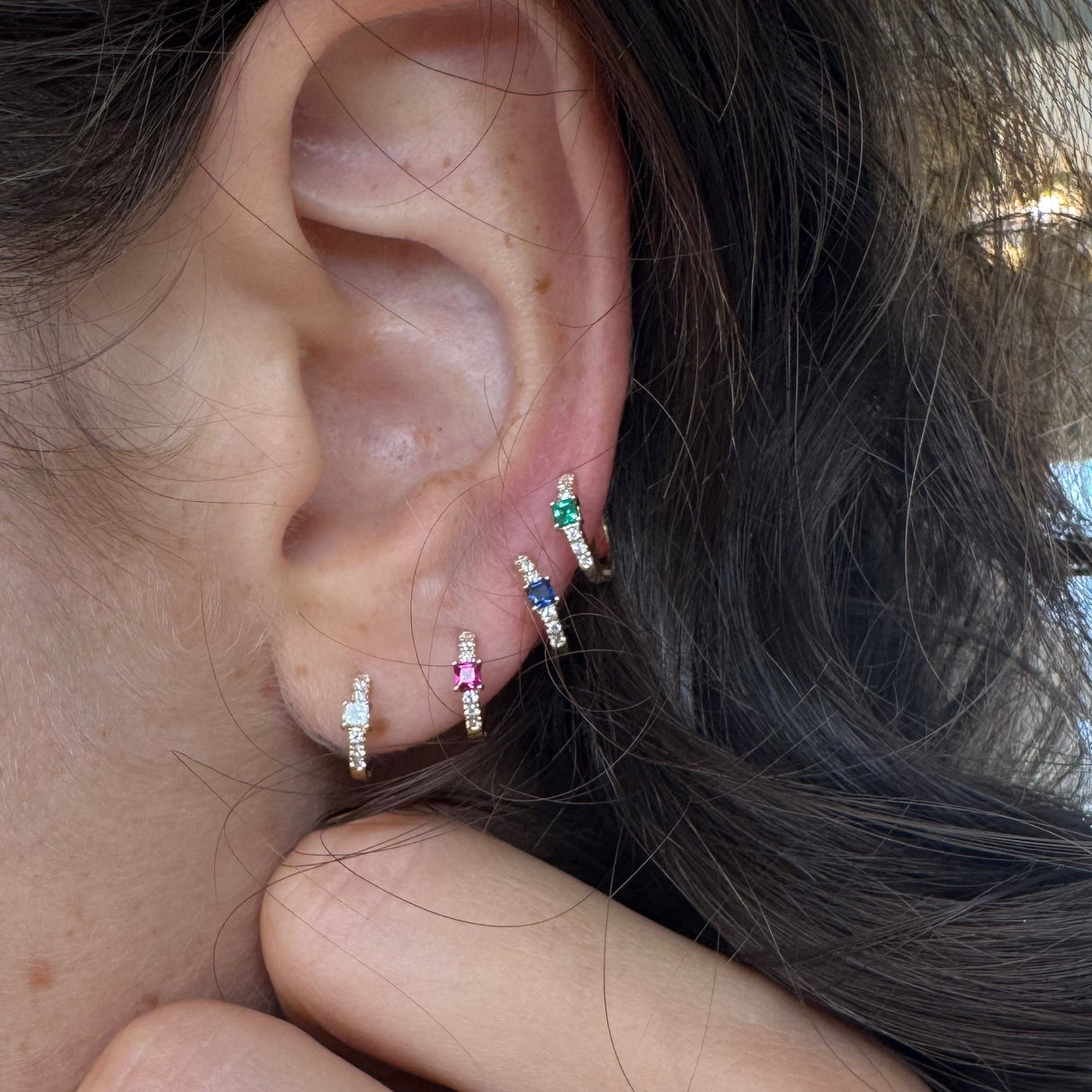 Rose gold circle earrings with diamonds and sapphire
