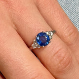 White gold ring with oval cut sapphire