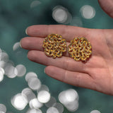 Golden button earring