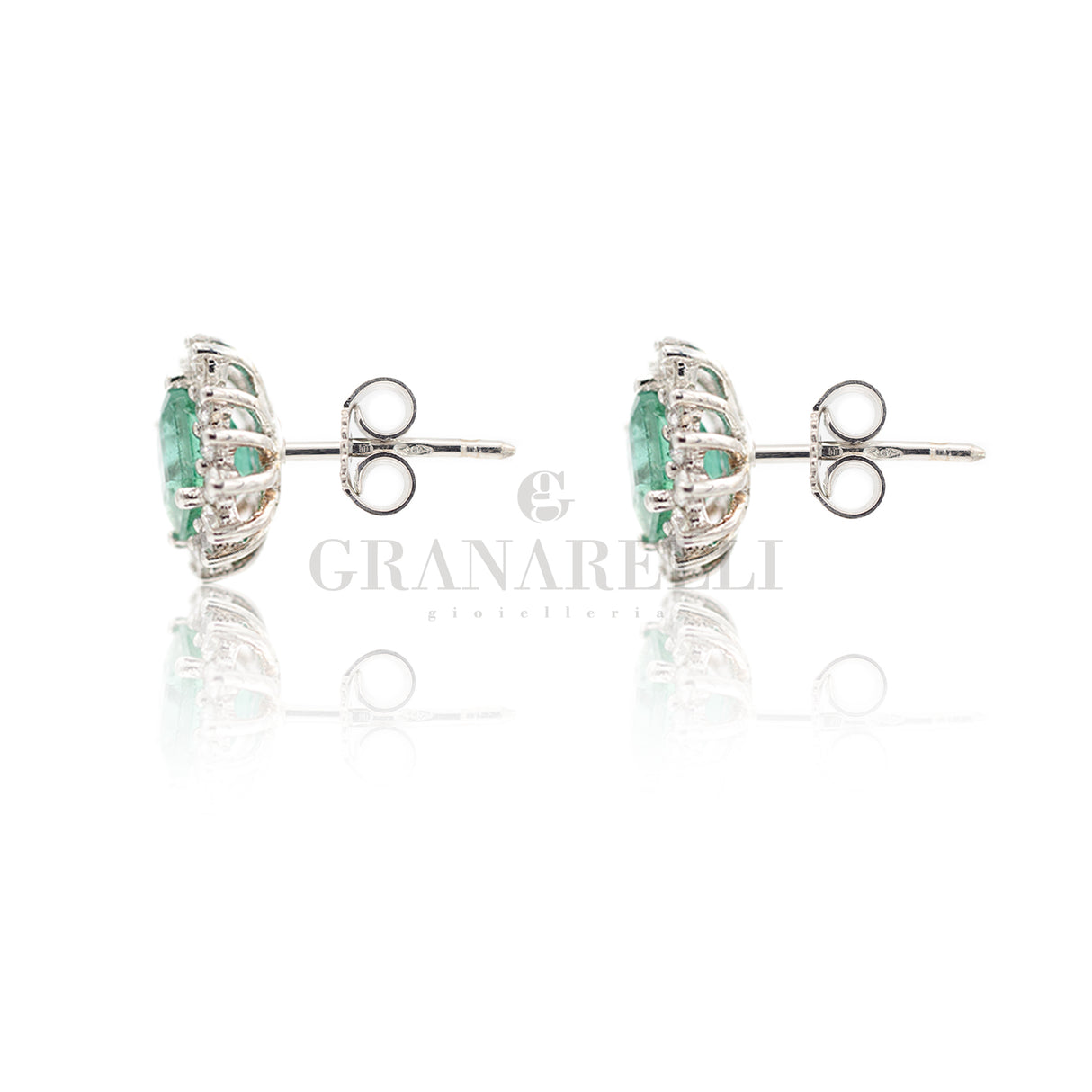 Oval emerald earrings 0.55kt and diamonds