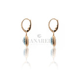Boucles d'oreilles traînantes avec diamants