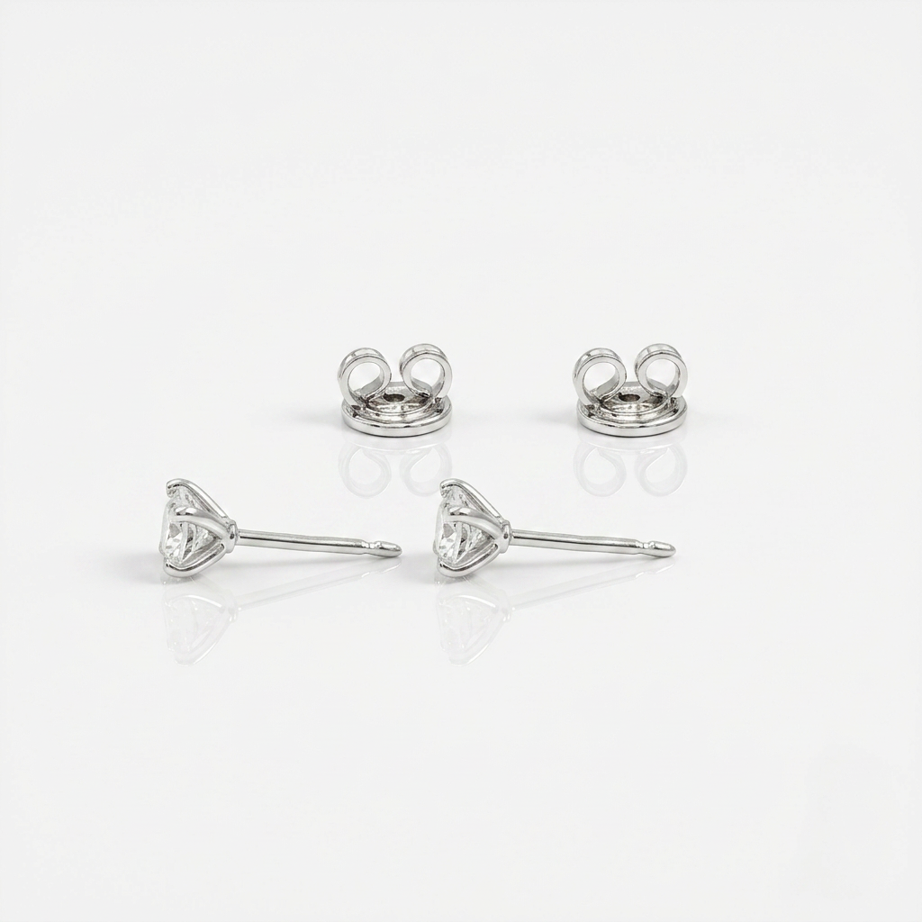 Orecchino Punto Luce Castone calice 1.12kt GIA