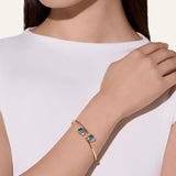 Bracciale Bangle Nudo in Oro Rosa con Topazio Blu London e Diamanti-Bracciali-POMELLATO-Gioielleria Granarelli