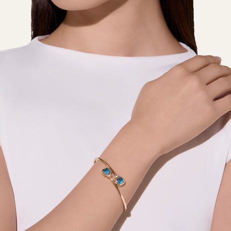 Bracciale Bangle Nudo in Oro Rosa con Topazio Blu London e Diamanti-Bracciali-POMELLATO-Gioielleria Granarelli