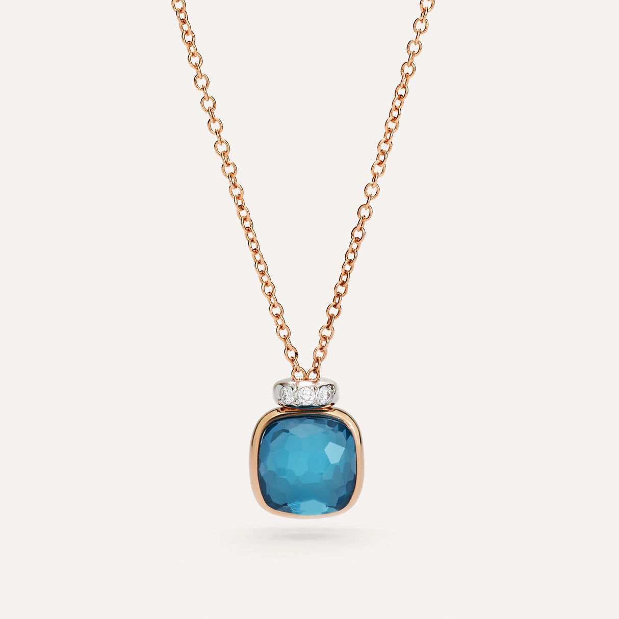 Collana Pendente Nudo Mini in Oro Rosa con Topazio Blu London e Diamanti-Girocolli-POMELLATO-Gioielleria Granarelli
