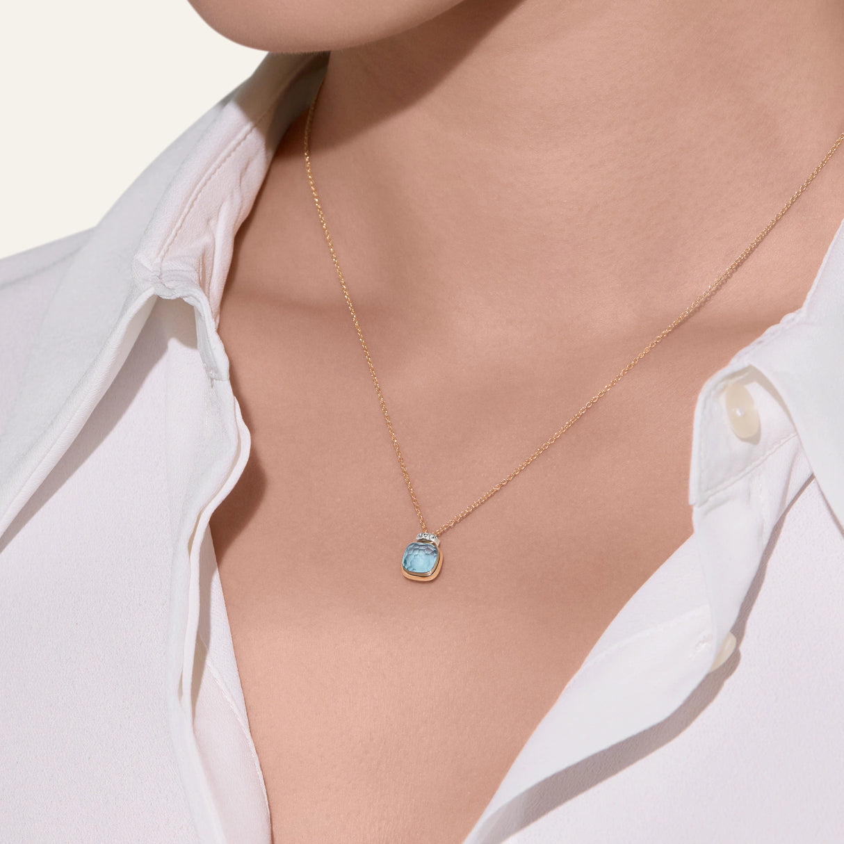 Collana Pendente Nudo Mini in Oro Rosa con Topazio Azzurro e Diamanti-Girocolli-POMELLATO-Gioielleria Granarelli