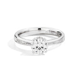 Anello Solitario 0.705kt con diamanti baguette 0.30kt