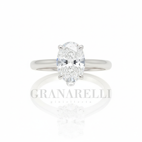 Anello solitario diamante ovale griffe arrotondate