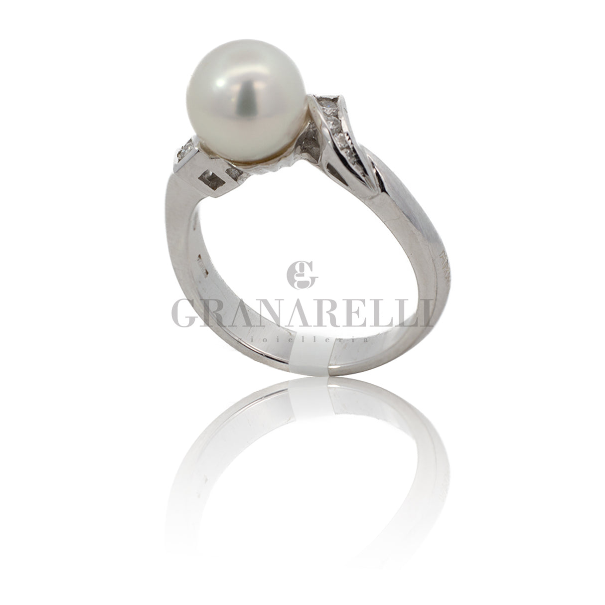 Anillo de corazón de zafiro y diamante