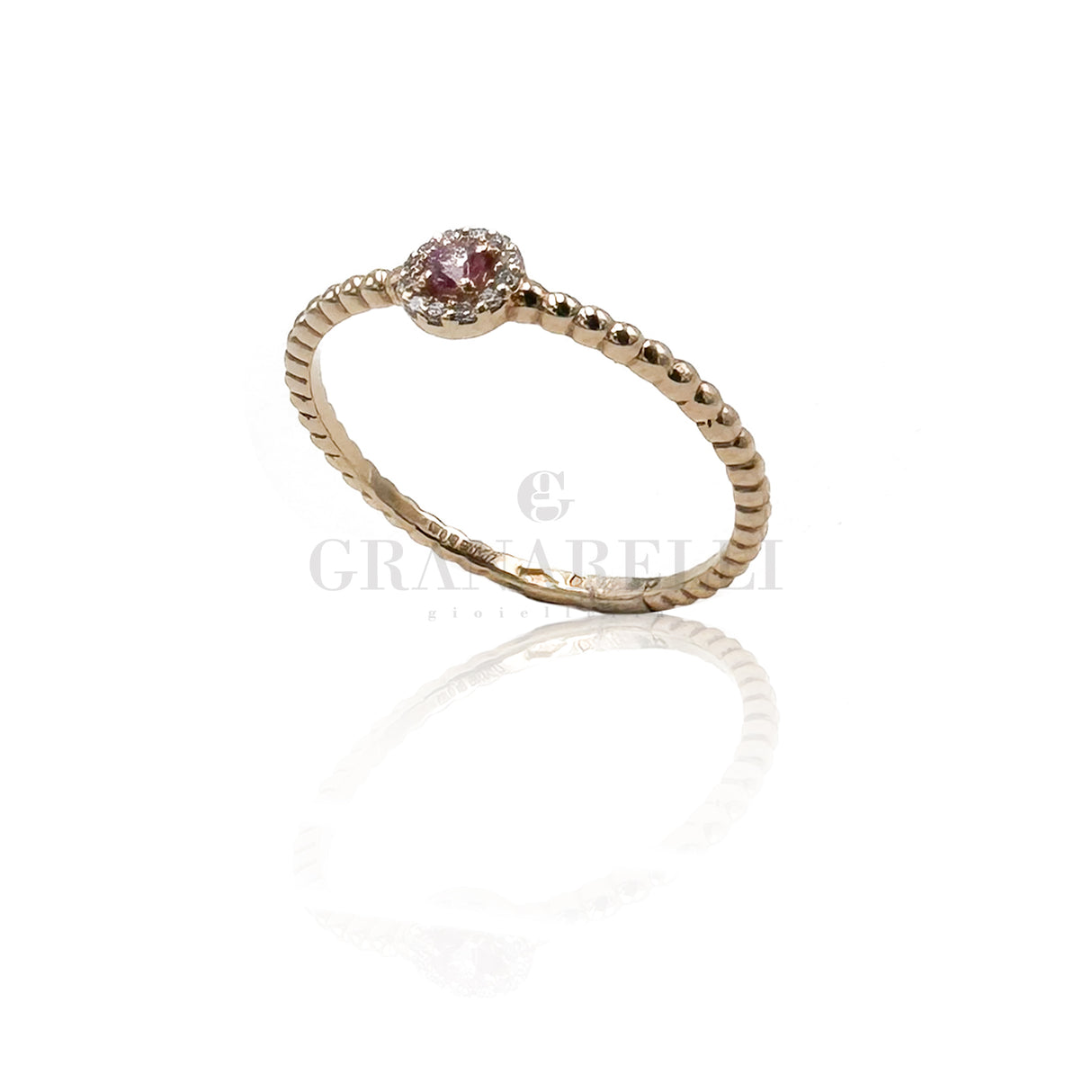 Anello punto luce diamante zaffiro rosa