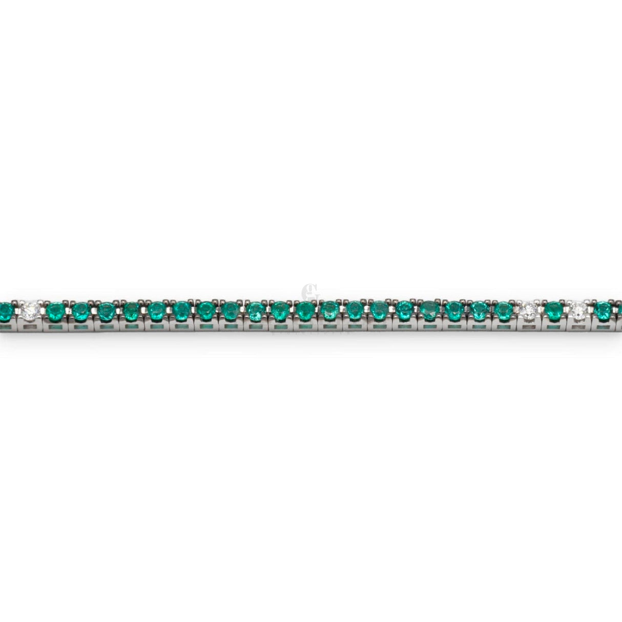 Bracciale Tennis Oro Bianco e Smeraldi 3.30kt e 5 spot bianchi