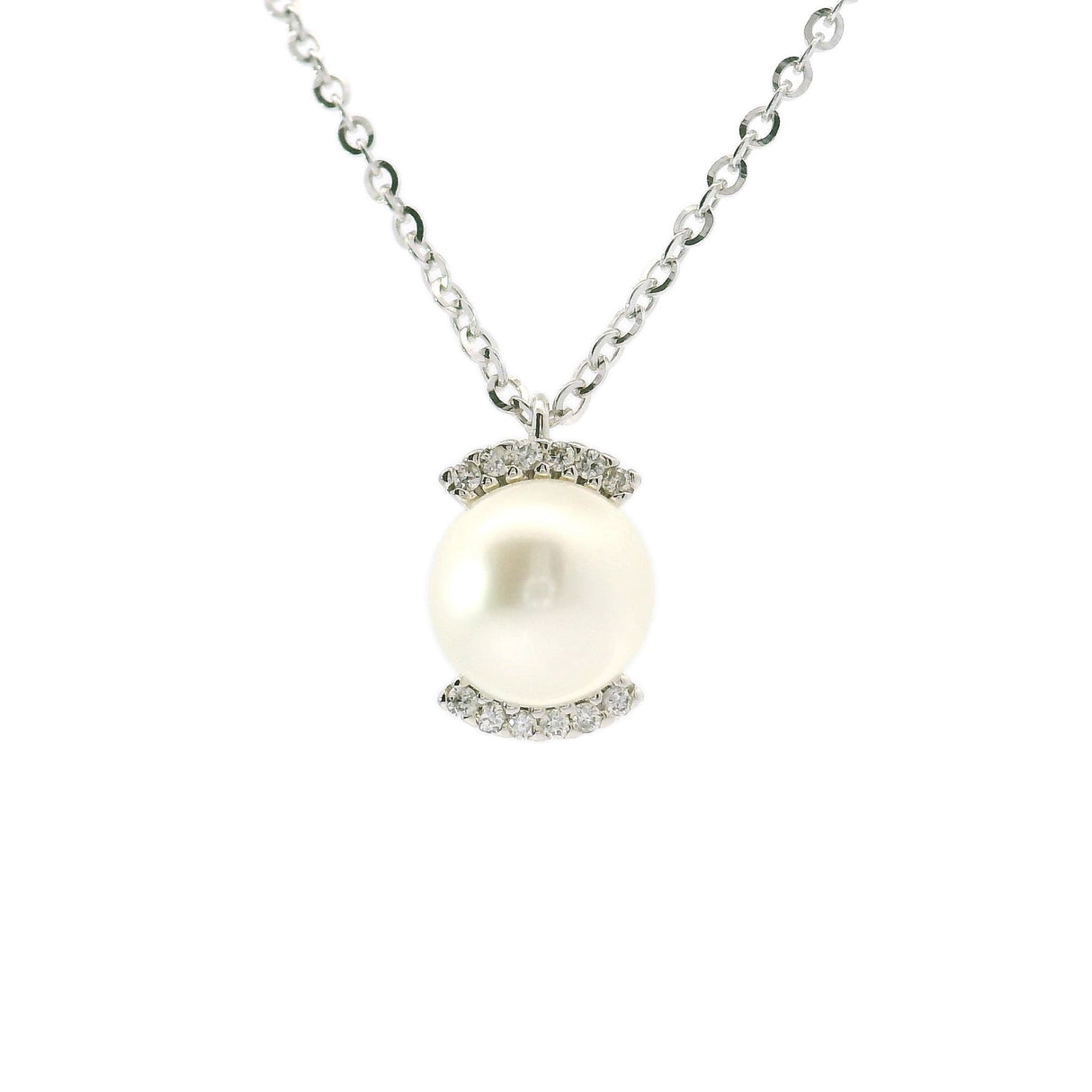 CHRIST CHRIST with pearl Ø 7.5 and white gold diamonds