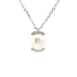 CHRIST CHRIST with pearl Ø 7.5 and white gold diamonds