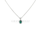 Oval emerald crew and diamonds