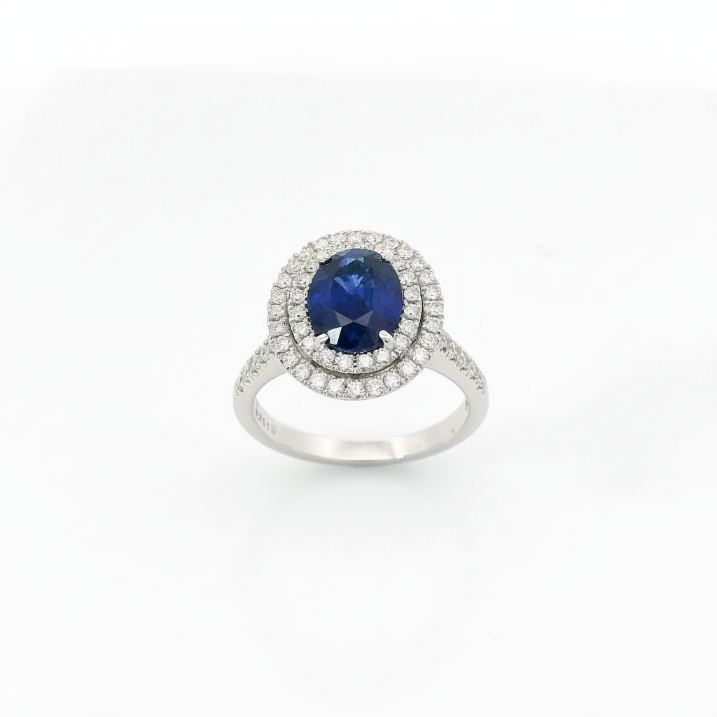 Ring sapphire oval double halo clean white background