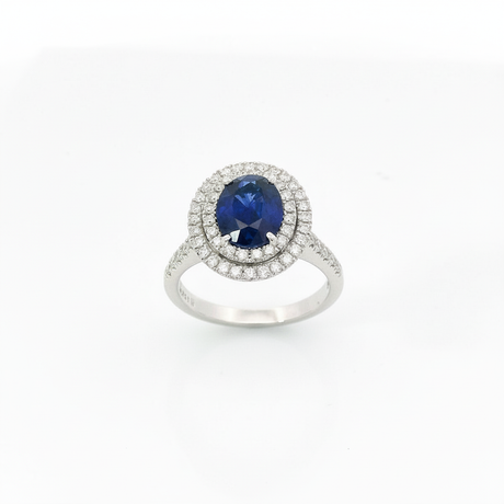 Ring sapphire oval double halo clean white background